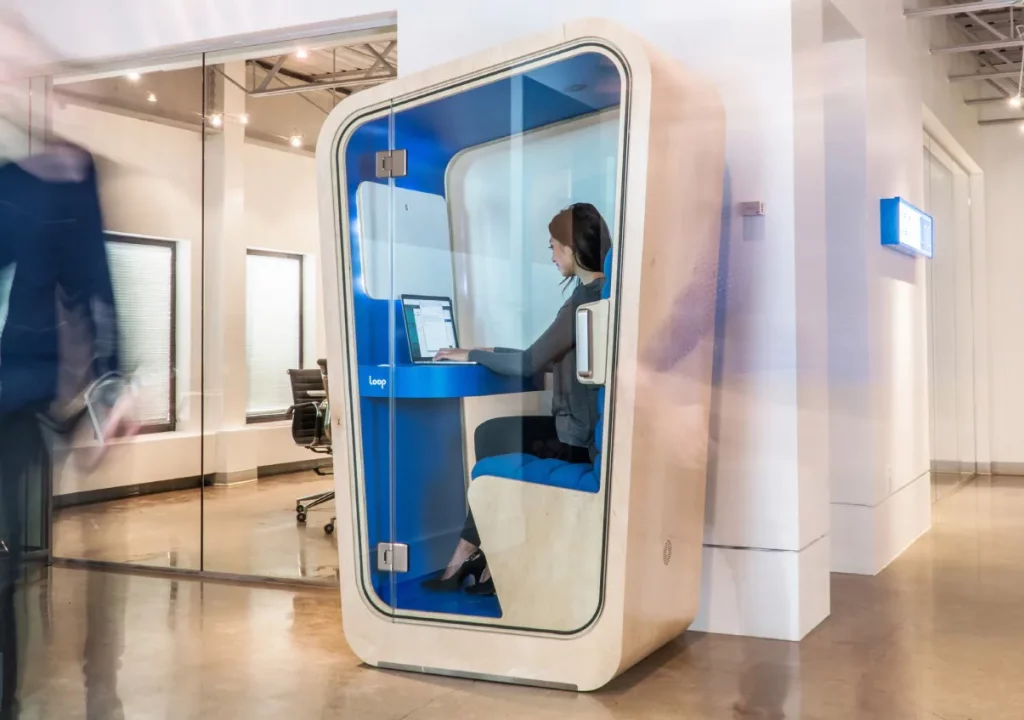 a phone booth in an open office